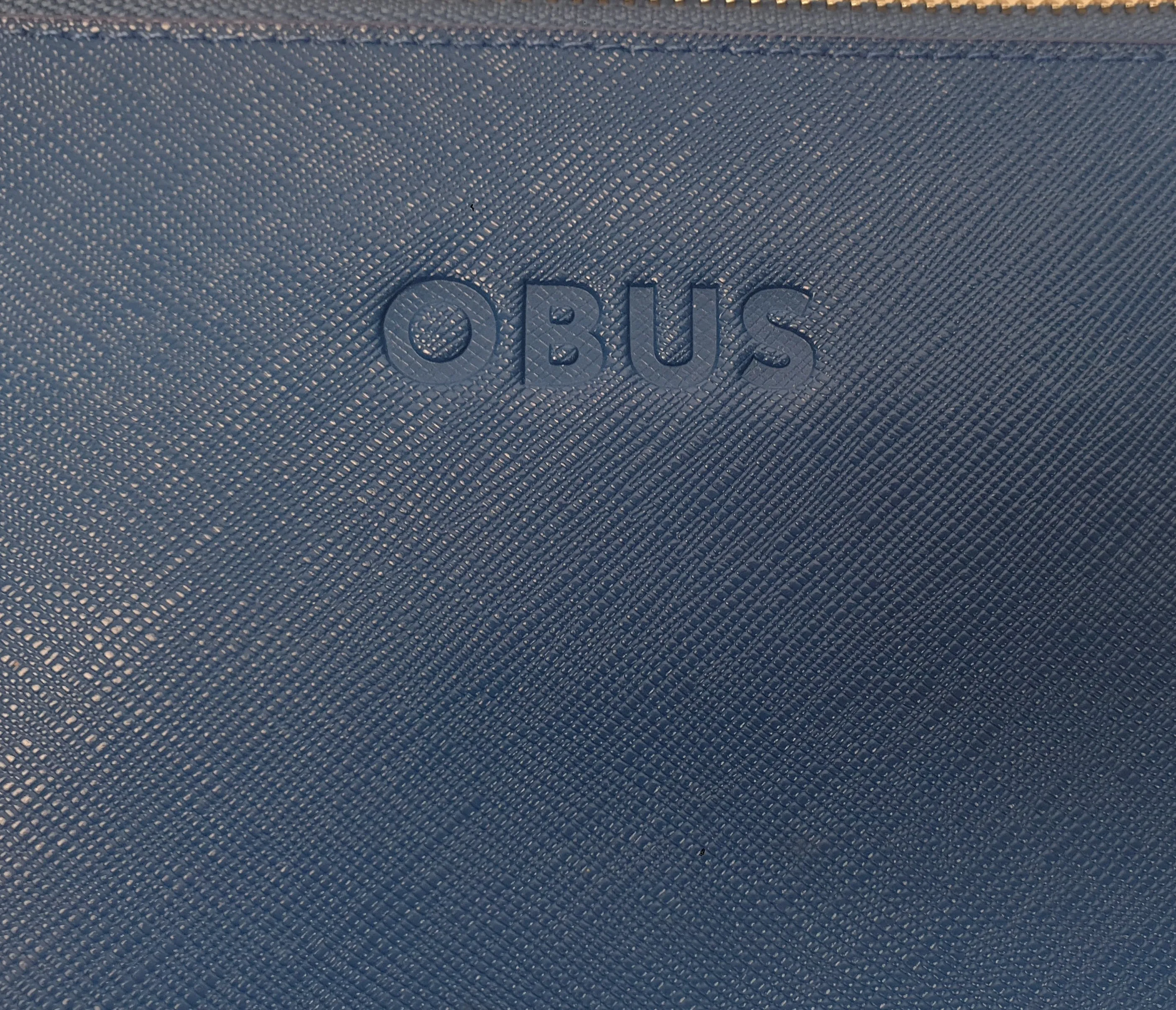 Obus blue leather clutch